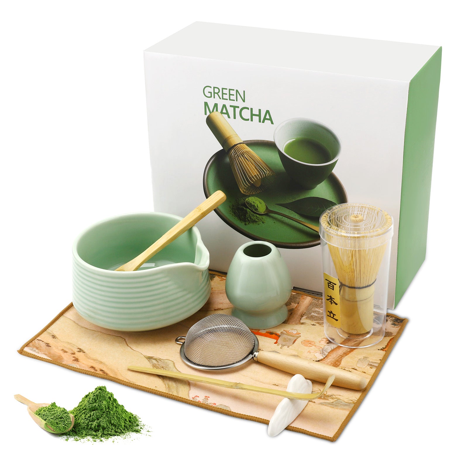 Matcha tea set with green bowl, whisk, and other tools on a white background