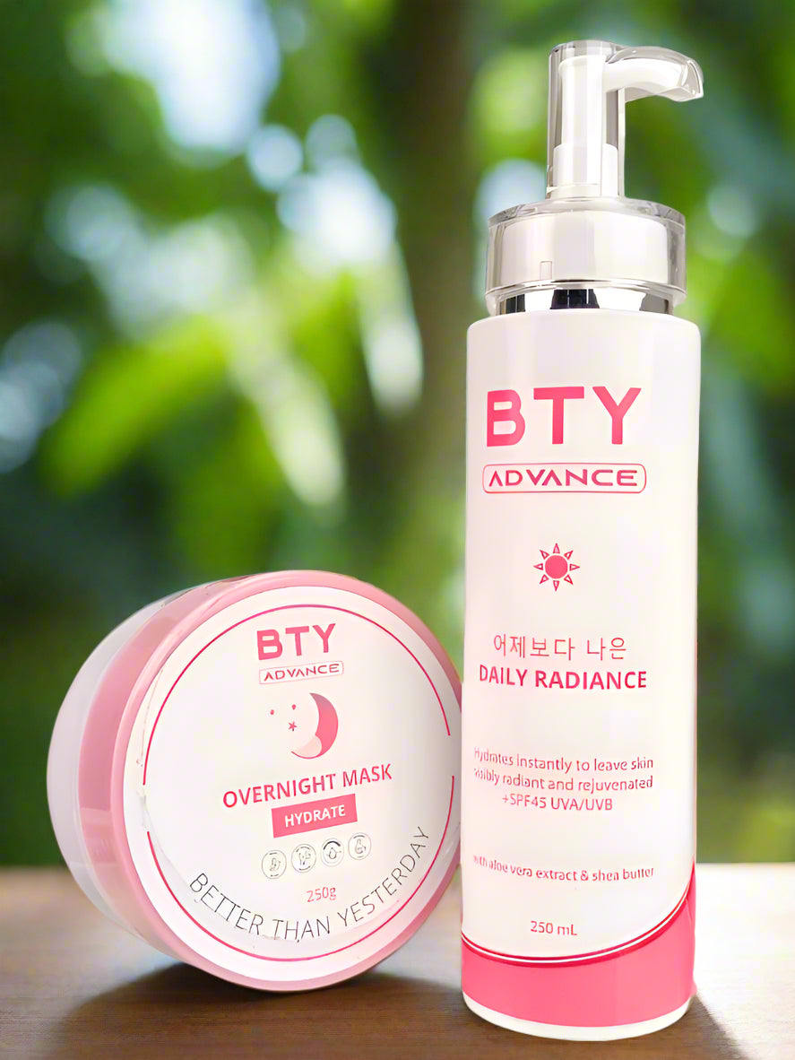 Two BTY Advance skincare products on a blurred green background