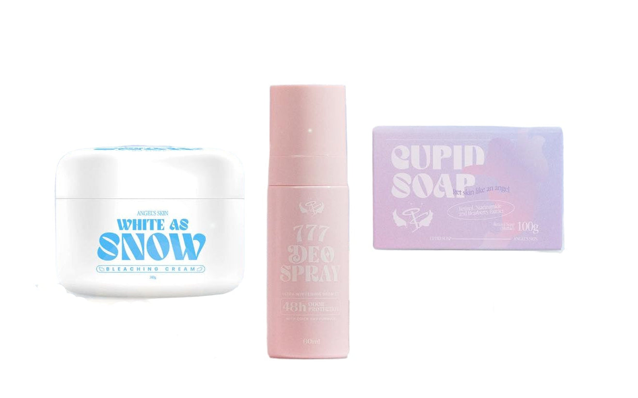 Set of skincare products including cream, serum, and soap on a white background