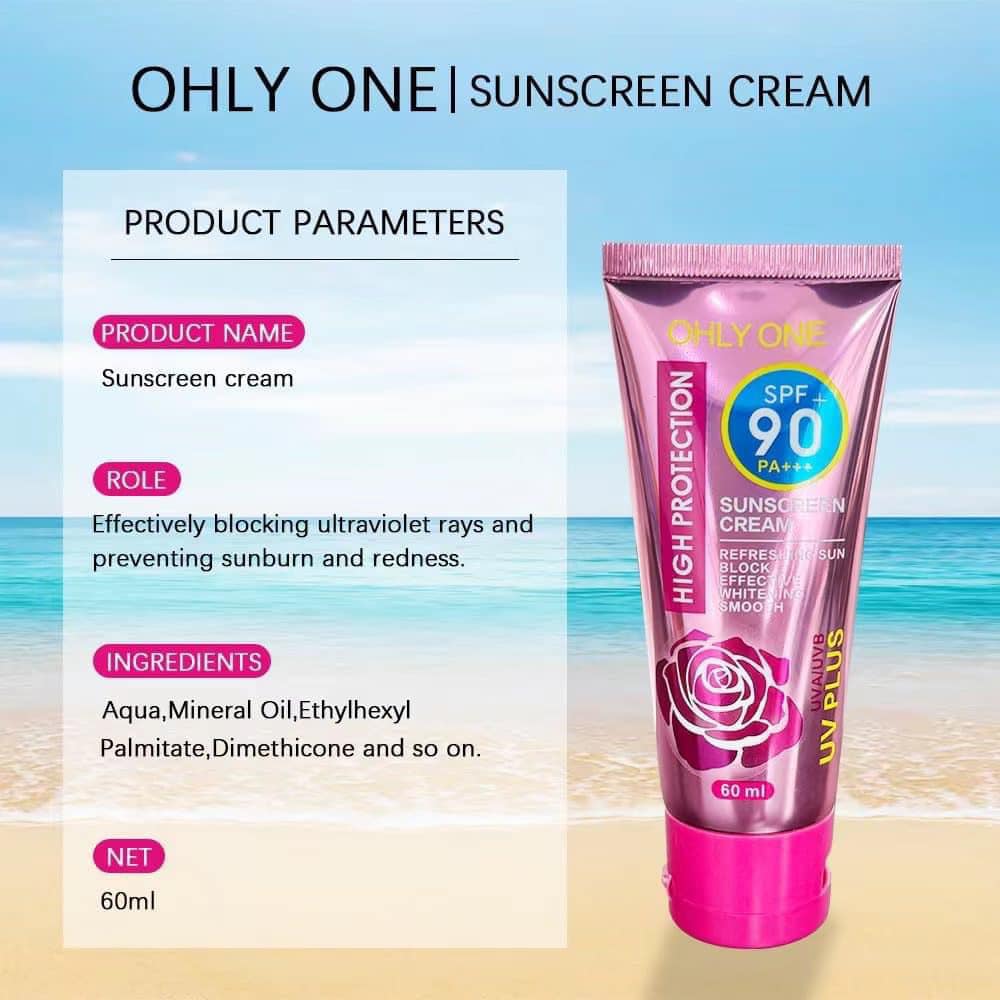 Pink sunscreen cream tube with product details on a beach background
