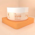Jar of cosmetic product on a peach-colored background