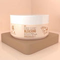 White jar of 'Pure Kojic Bleaching Serum' on a beige platform with a peach background