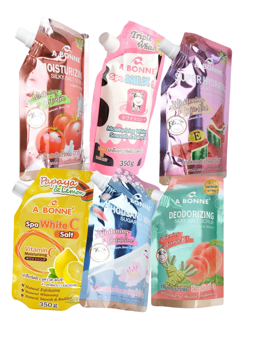 Multiple packets of A Bonne Spa Milk Salt Shower Salt Body Scrub in various flavors, each with a different color label.