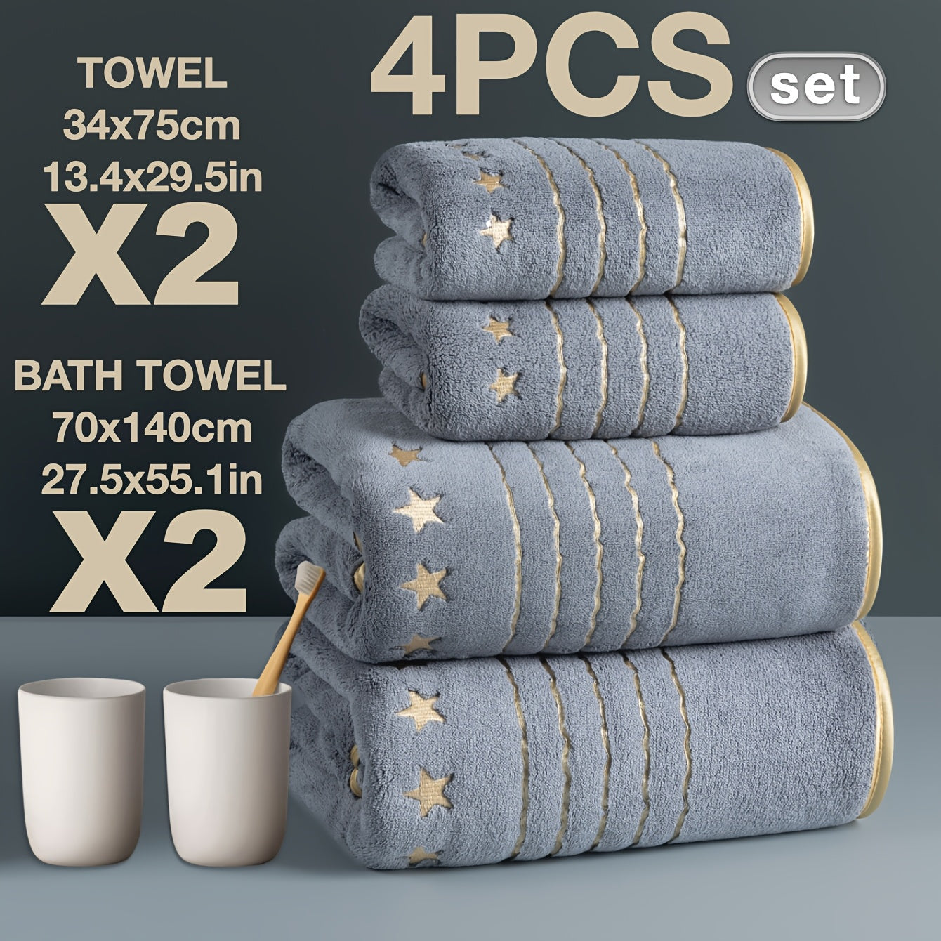 Set of four blue towels with star patterns, two bath towels and two hand towels, on a gray background.