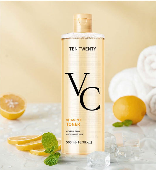 TEN TWENTY Vitamin C toner bottle with lemons and mint leaves on a light background