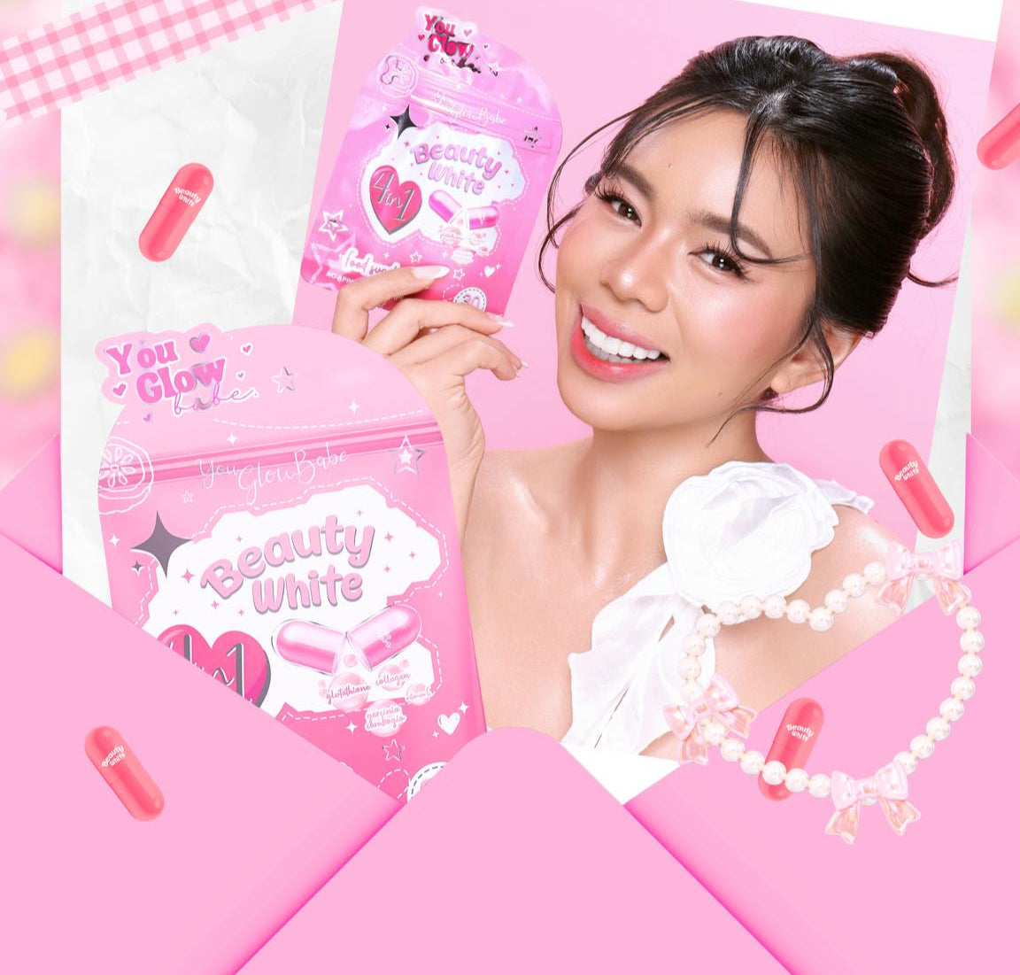 Woman holding Youglow Babemain beauty products on a pink background