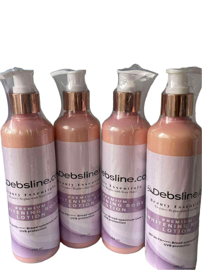 Four bottles of Debsline Premium Whitening Lotion on a white background