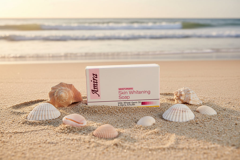 Amira Skin Whitening Soap on a sandy beach with shells