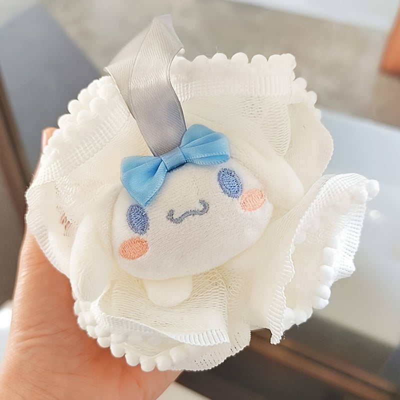 White mesh scrub with a cartoon character and blue bow held by a hand.