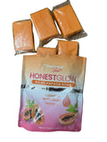Honest Glow Kojic Papaya Soap packaging with soap bars on a wooden surface