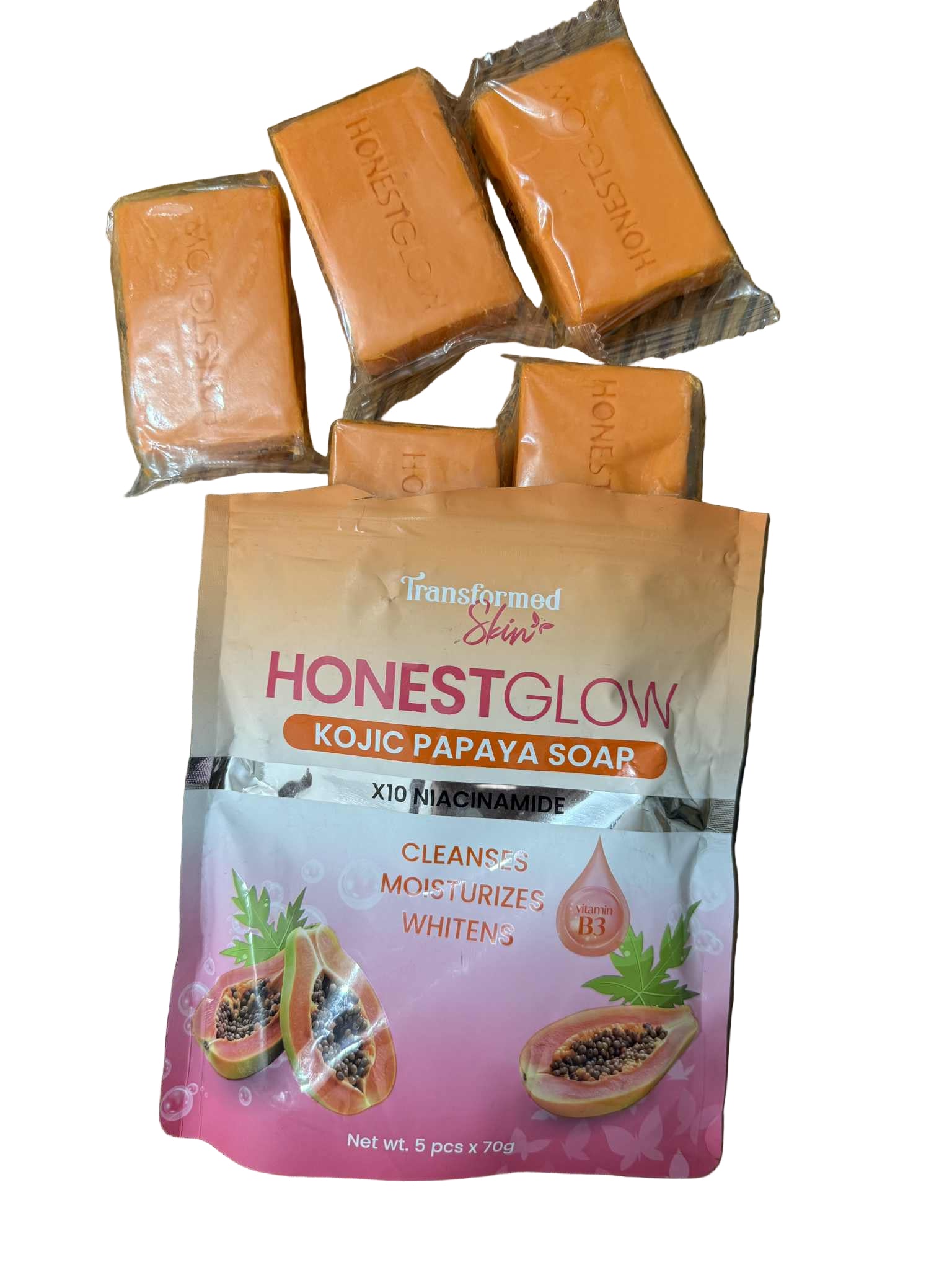 Honest Glow Kojic Papaya Soap packaging with soap bars on a wooden surface