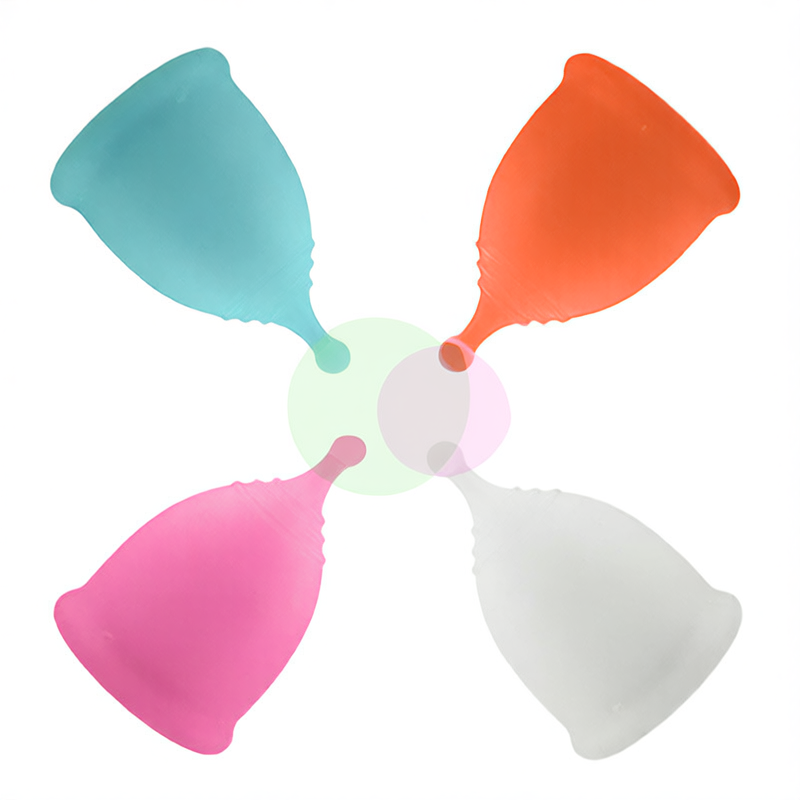 Five colorful silicone cups arranged in a circular pattern on a white background