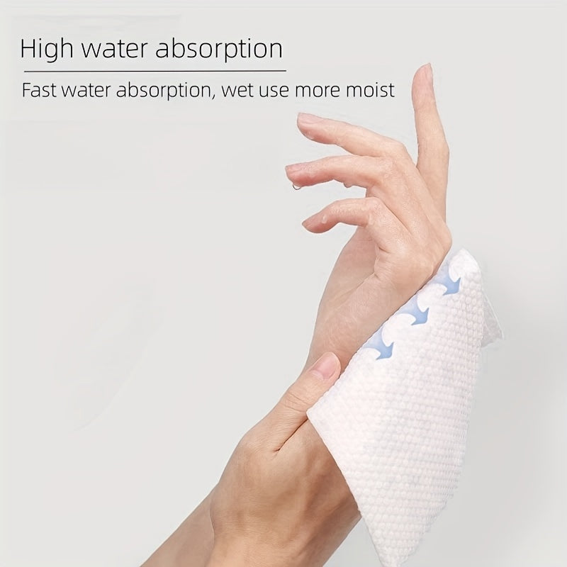 Hand using a white towel with text about high water absorption.