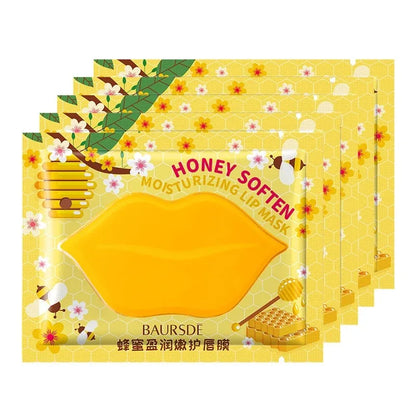 Pack of honey moisturizing lip mask with floral design on yellow background