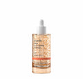 Genabelle Farn Vita Toning Ampoule in a clear glass dropper bottle with a white cap, filled with a peachy-orange liquid containing small gold-toned particles, on a solid white background.