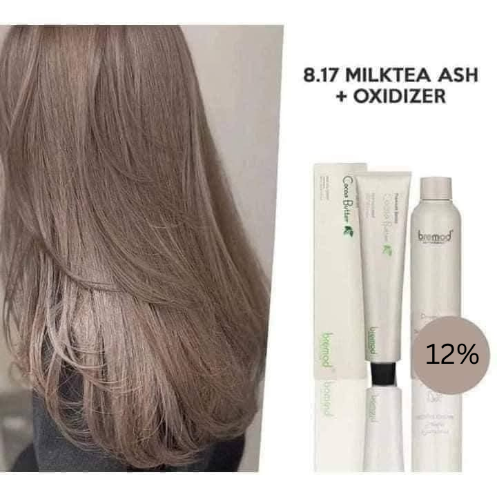 Hair color product with '8.17 Milktea Ash' shade and 'Oxidizer' on a neutral background.
