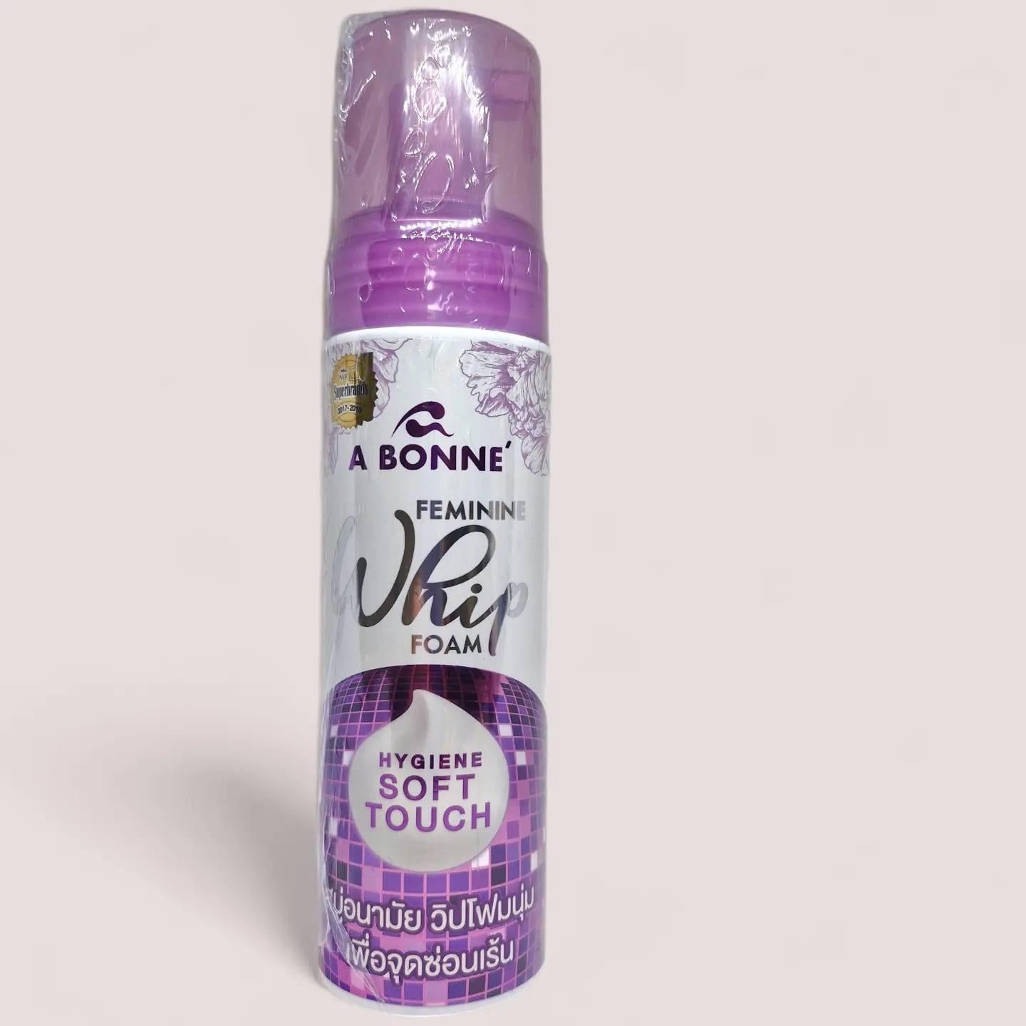 A bottle of A Bonne Feminine Whip Foam on a light gray background