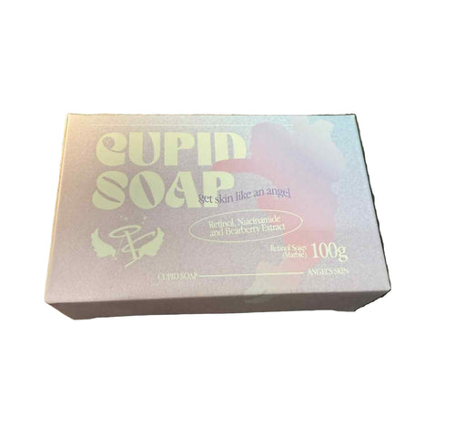 Box of Cupid Soap on a dark textured surface