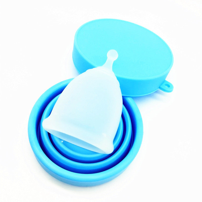 Set of blue silicone products including a funnel and containers on a white background