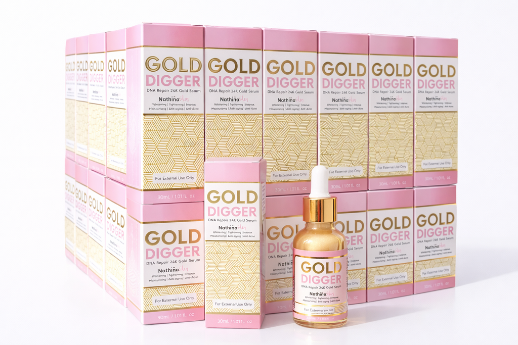 Gold Digger skincare product packaging including boxes and a dropper bottle on a white background