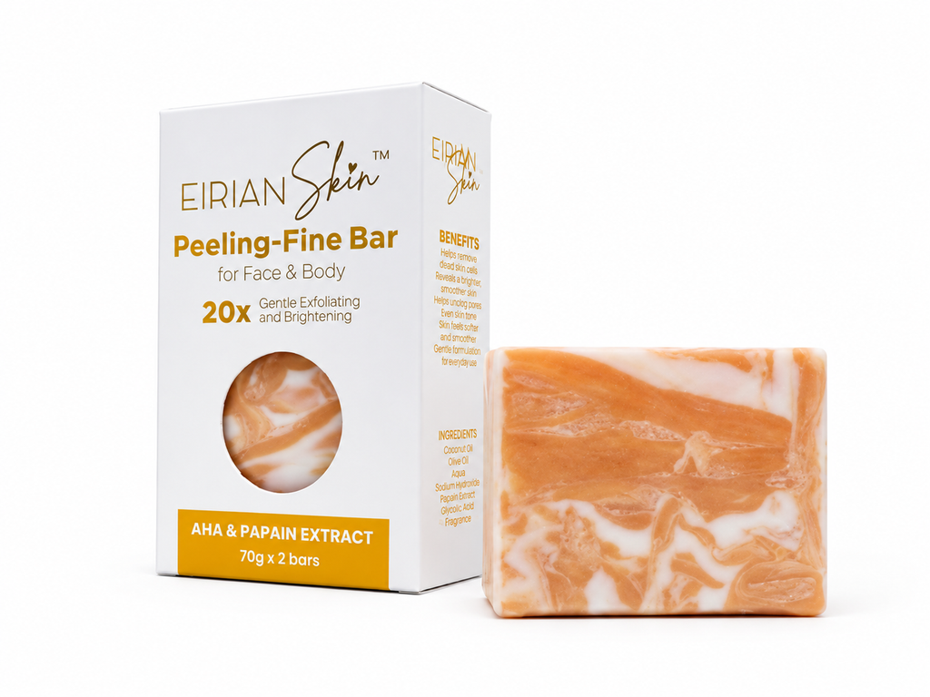 Eirian Skin Peeling-Fine Bar soap shown next to its white and gold packaging box on a clean white background. The bar soap features a marbled pattern of orange and white.