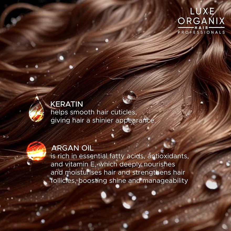 Close-up of brown hair with Luxe Organix branding, highlighting keratin and argan oil benefits.