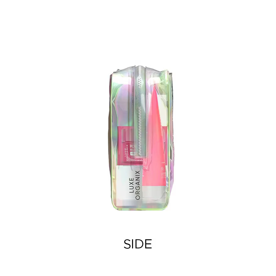 Transparent cosmetic bag with pink and green items inside on a white background