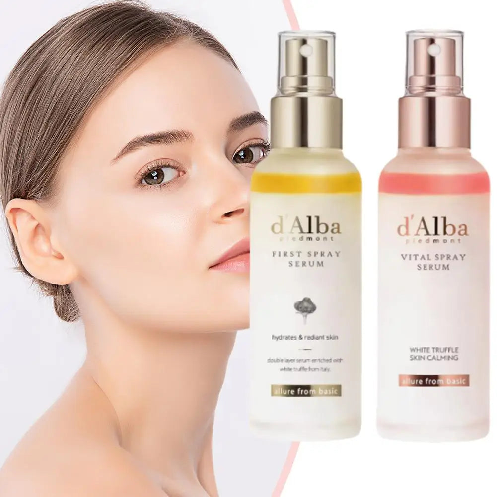 Two d'Alba skincare serum bottles with a woman's face in the foreground.