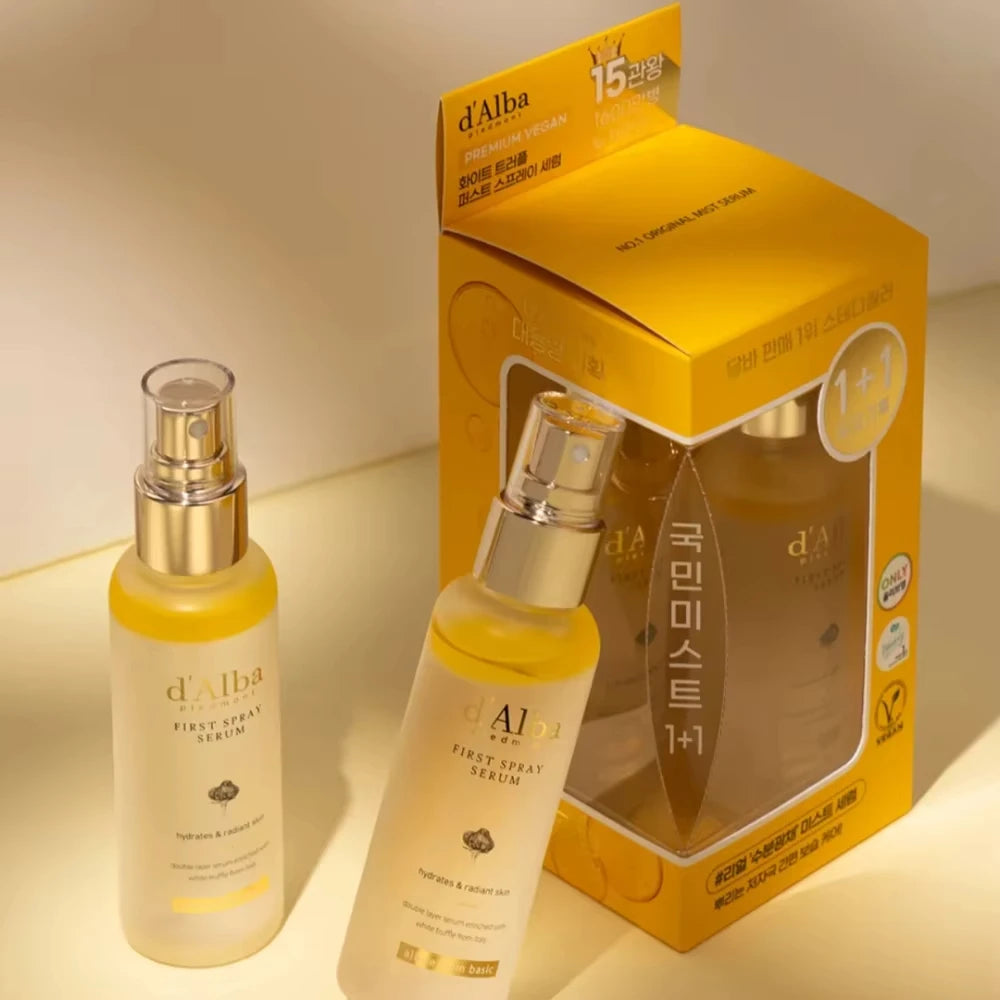 Two bottles of d'Alba serum with their packaging on a beige background