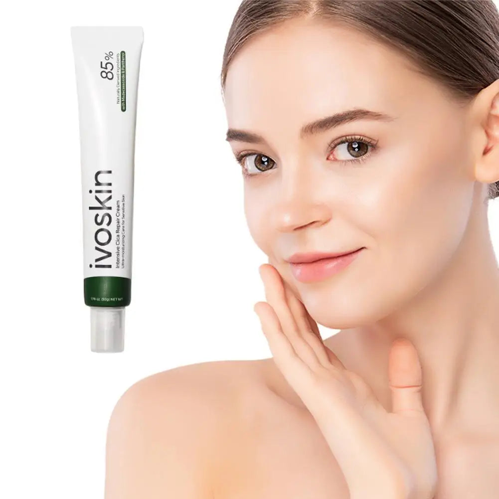 Woman touching her face with an ivoskin skincare product on a white background