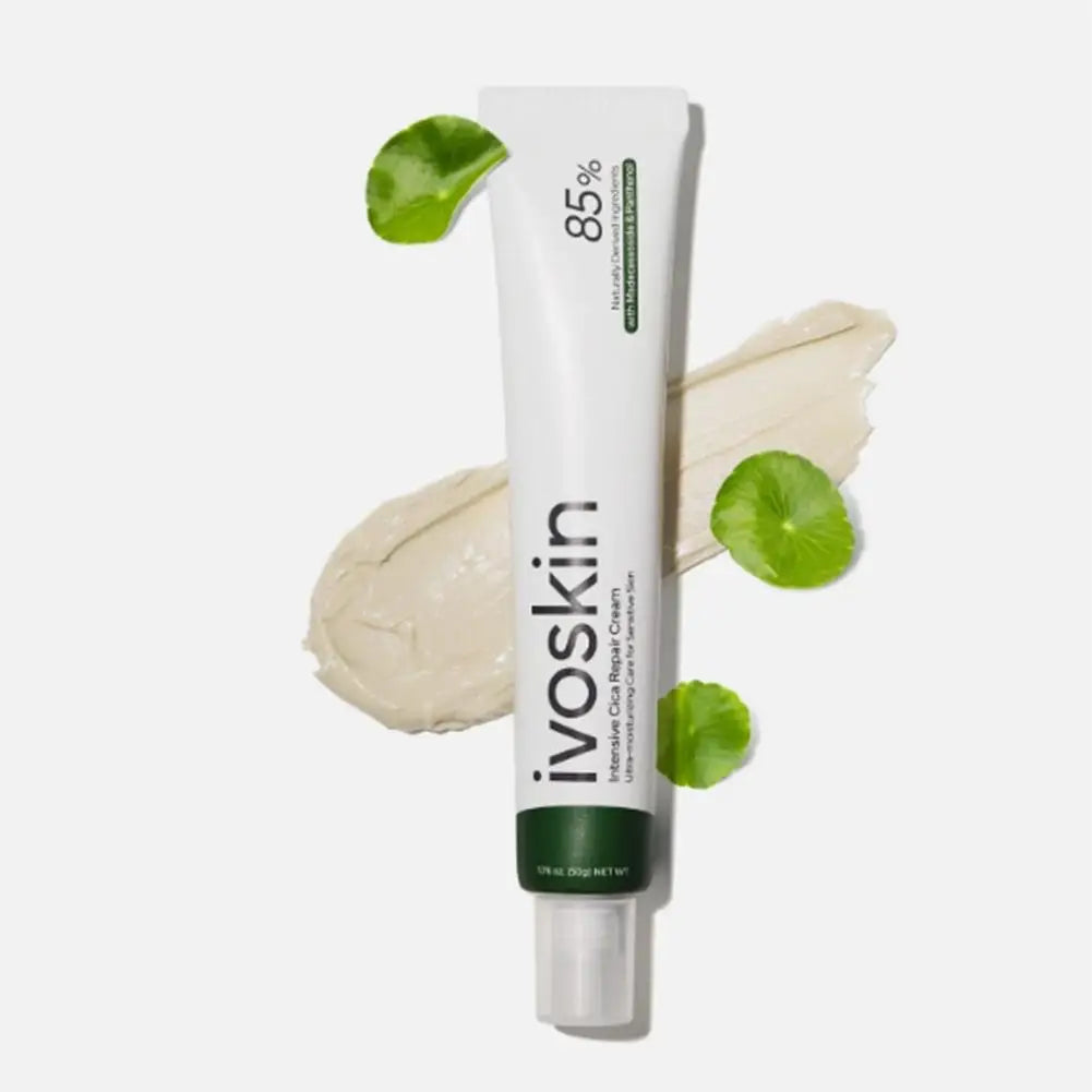 Ivoskin skincare product with cream and green leaves on a white background