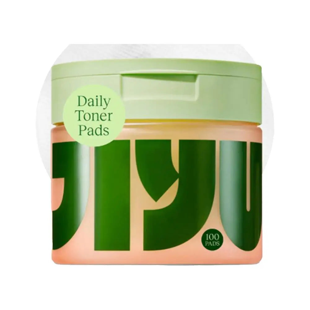 Container of Daily Toner Pads with green and peach design on a white background