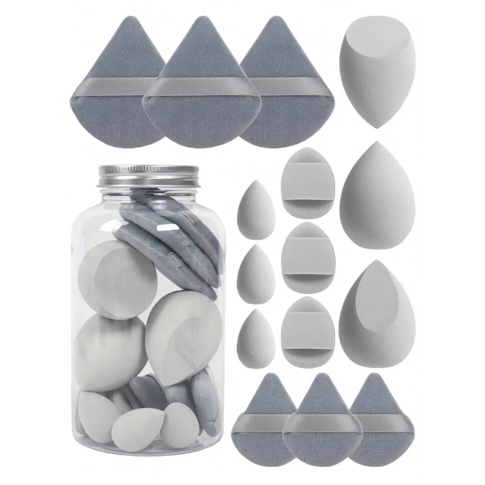 grey makeup sponge blender with triangle powder puff and mini finger powder puff in a jar