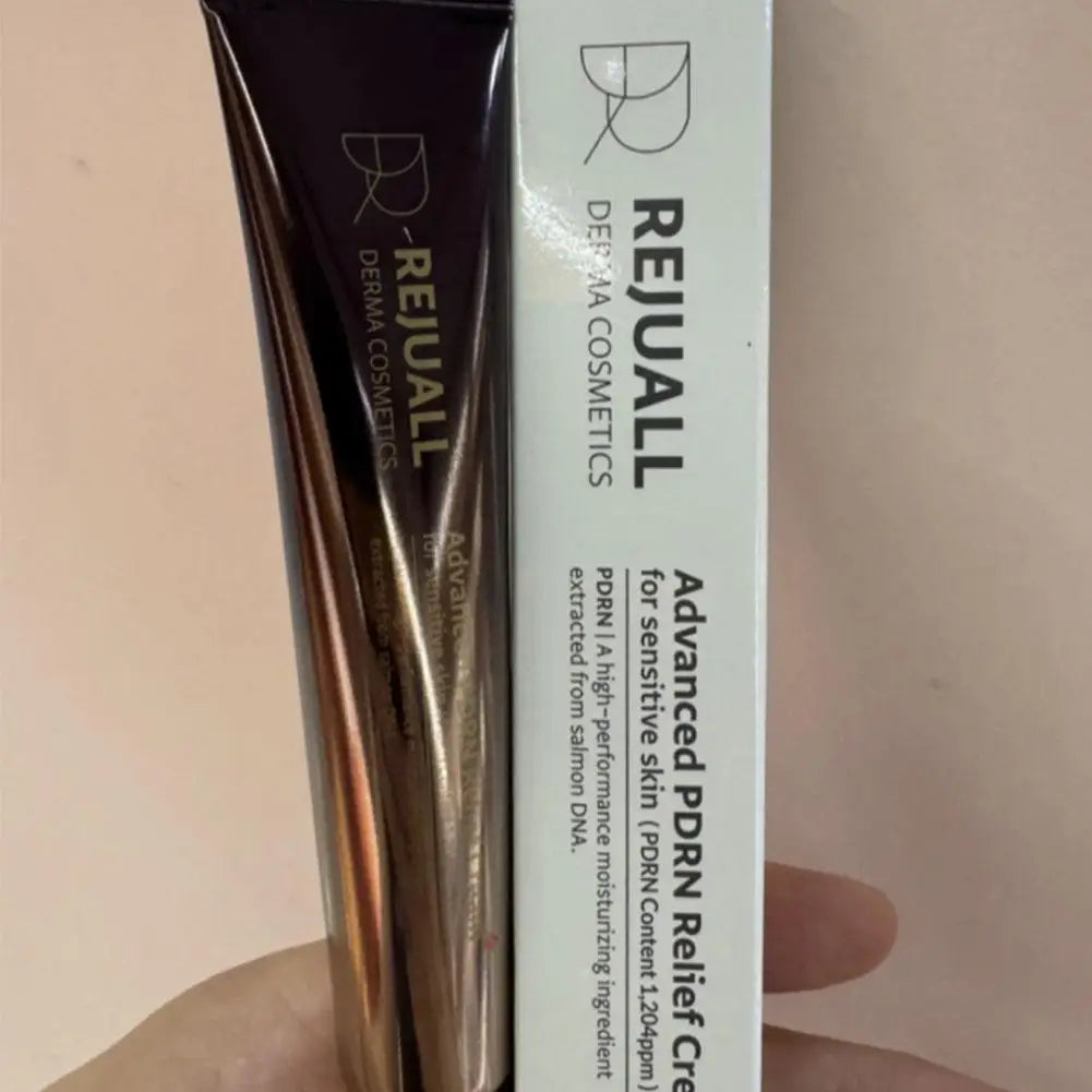 Rejuall Derma Cosmetics Advanced PDRN Relief Cream packaging on a beige background