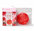 Red rose-shaped soap with packaging on a white background