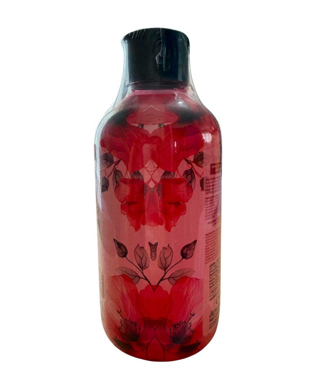 Bottle with floral design on a white background