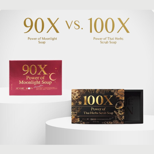 Two rectangular soap bars displayed on white pedestals with promotional text above reading '90X vs. 100X' and 'Power of Moonlight Soap' versus 'Power of Thai Herbs Scrub Soap.