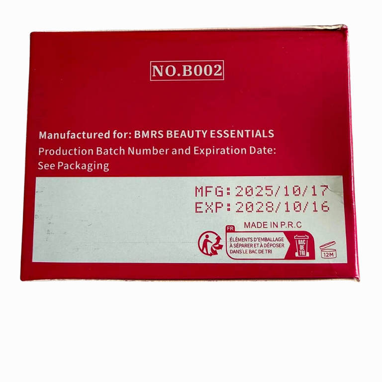 A red rectangular product box with white printed text, including 'NO.B002' and 'Manufactured for: BMRS BEAUTY ESSENTIALS', photographed on a plain white background.