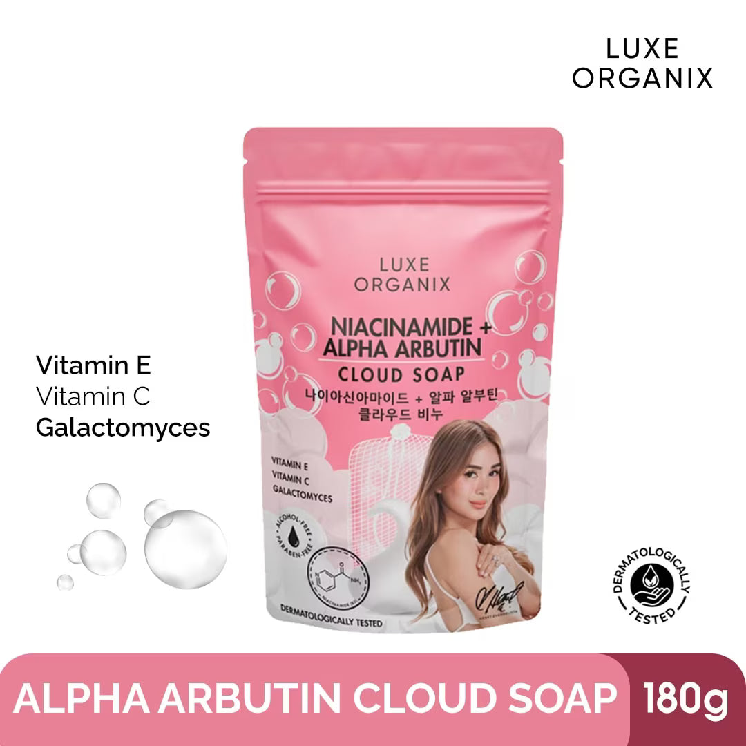 Pink package of Luxe Organix Alpha Arbutin Cloud Soap with a woman's face on the label.