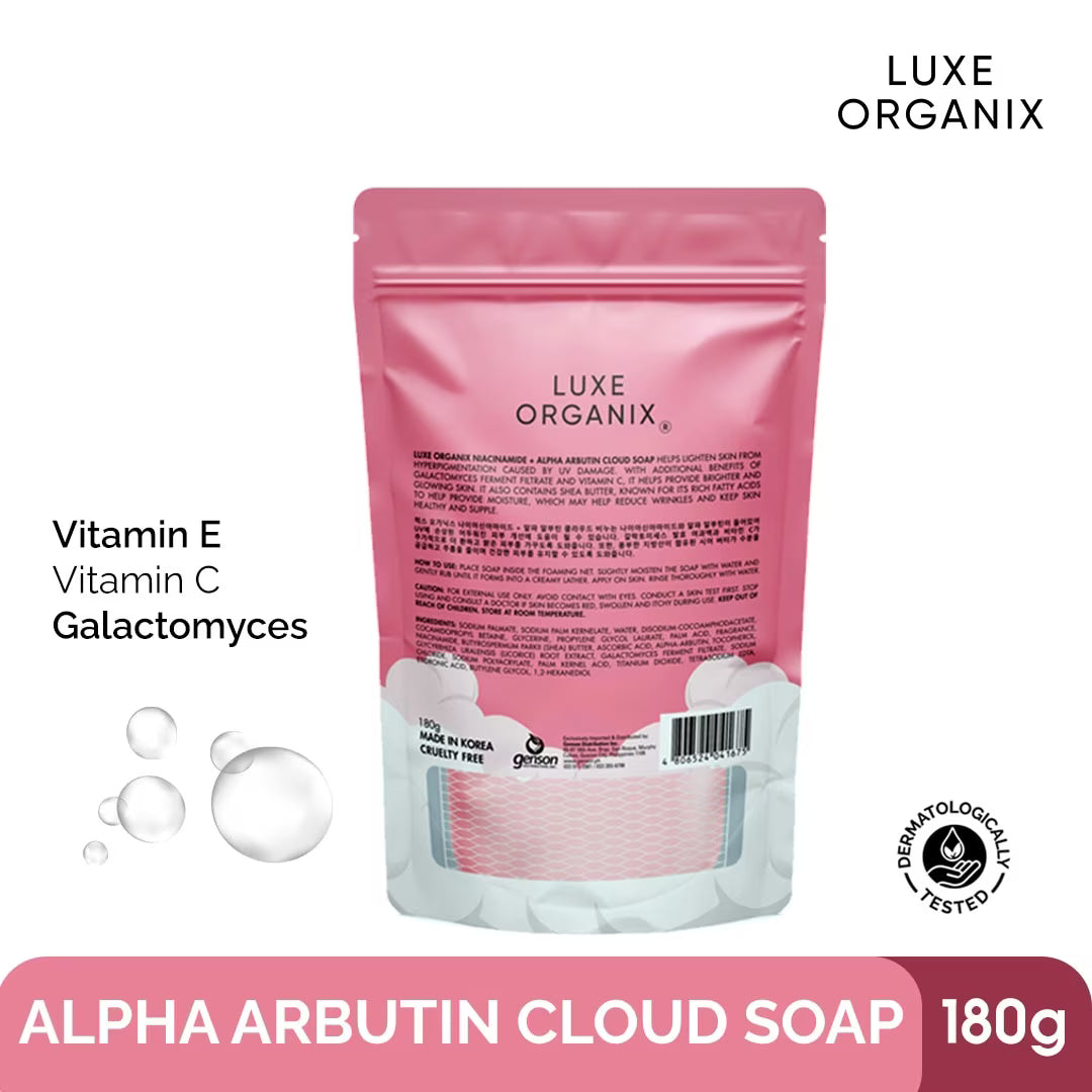 Pink packaging of Luxe Organix Alpha Arbutin Cloud Soap with text and branding details.