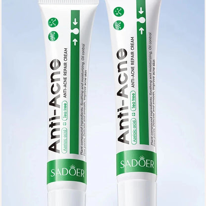 Two tubes of Sadoer Anti-Acne repair cream on a light blue background
