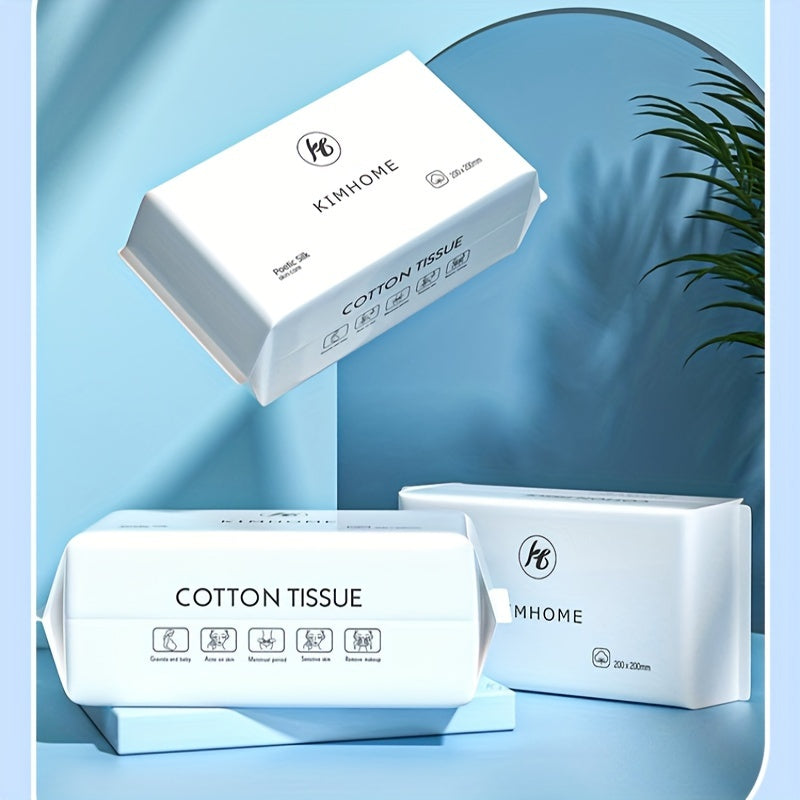 KIMHOME cotton tissue packaging on a light blue background with a plant.