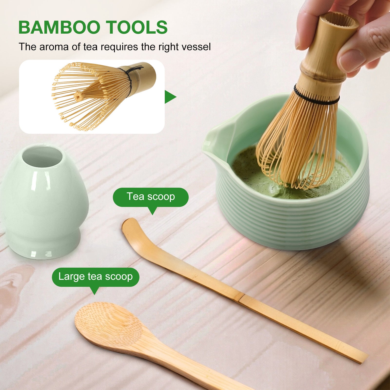 Bamboo tea-making tools including a whisk, scoop, and large scoop on a wooden surface.