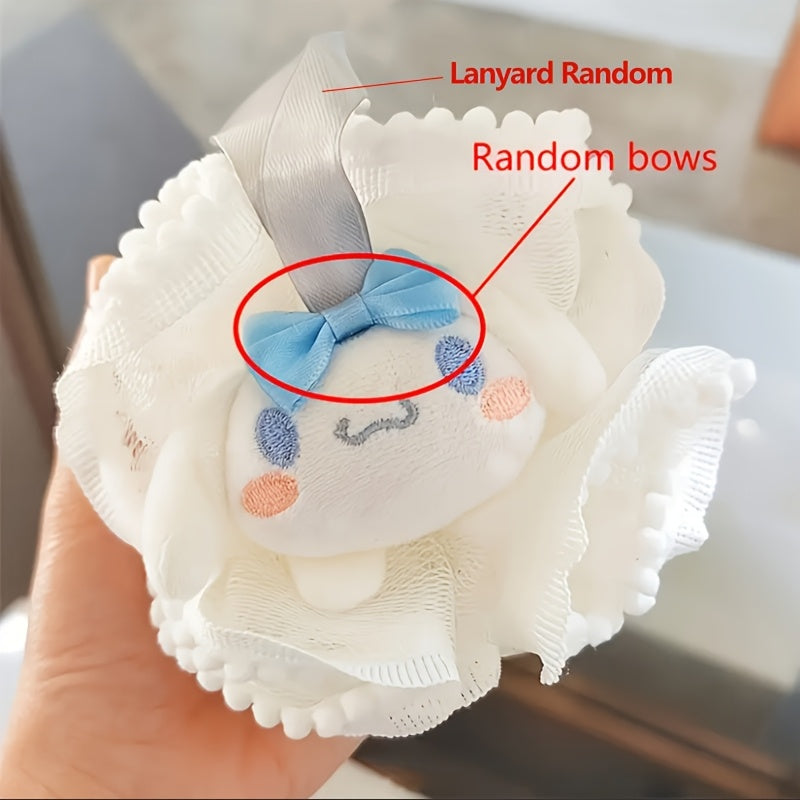 White fluffy toy with a blue bow held by a hand, labeled 'Lanyard Random' and 'Random bows'.