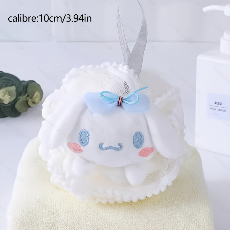 White plush toy with a blue bow on a white background