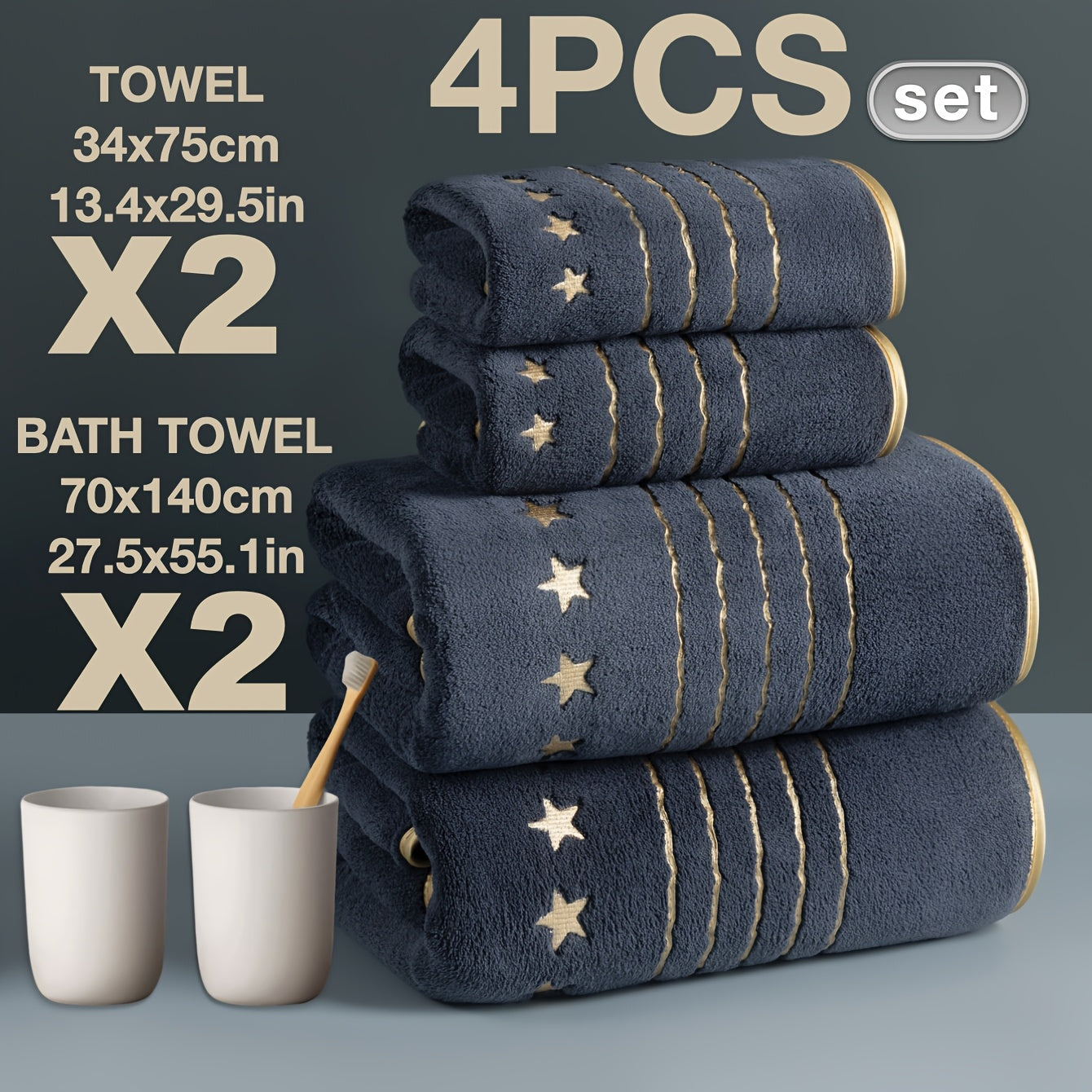 Set of four navy blue towels with gold accents, two bath towels and two hand towels, on a gray background.